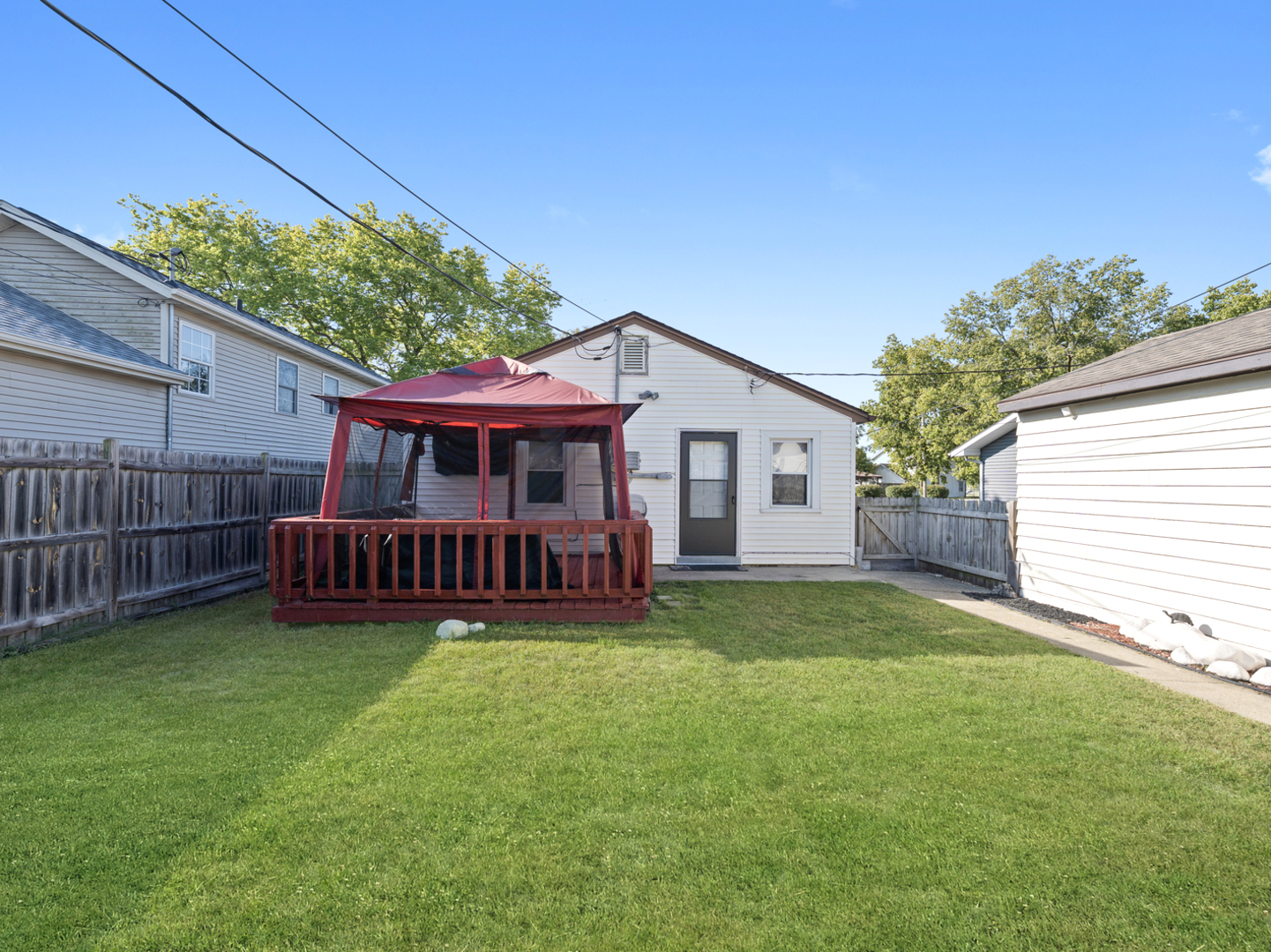 1446 Erie Street Ottawa, IL 61350 - Photo 29 of 41 a view of a house with a yard and deck