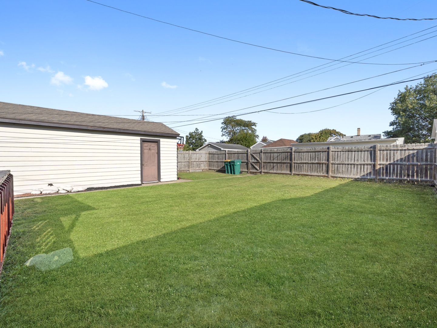 1446 Erie Street Ottawa, IL 61350 - Photo 32 of 41 a view of a backyard with a garden and plants