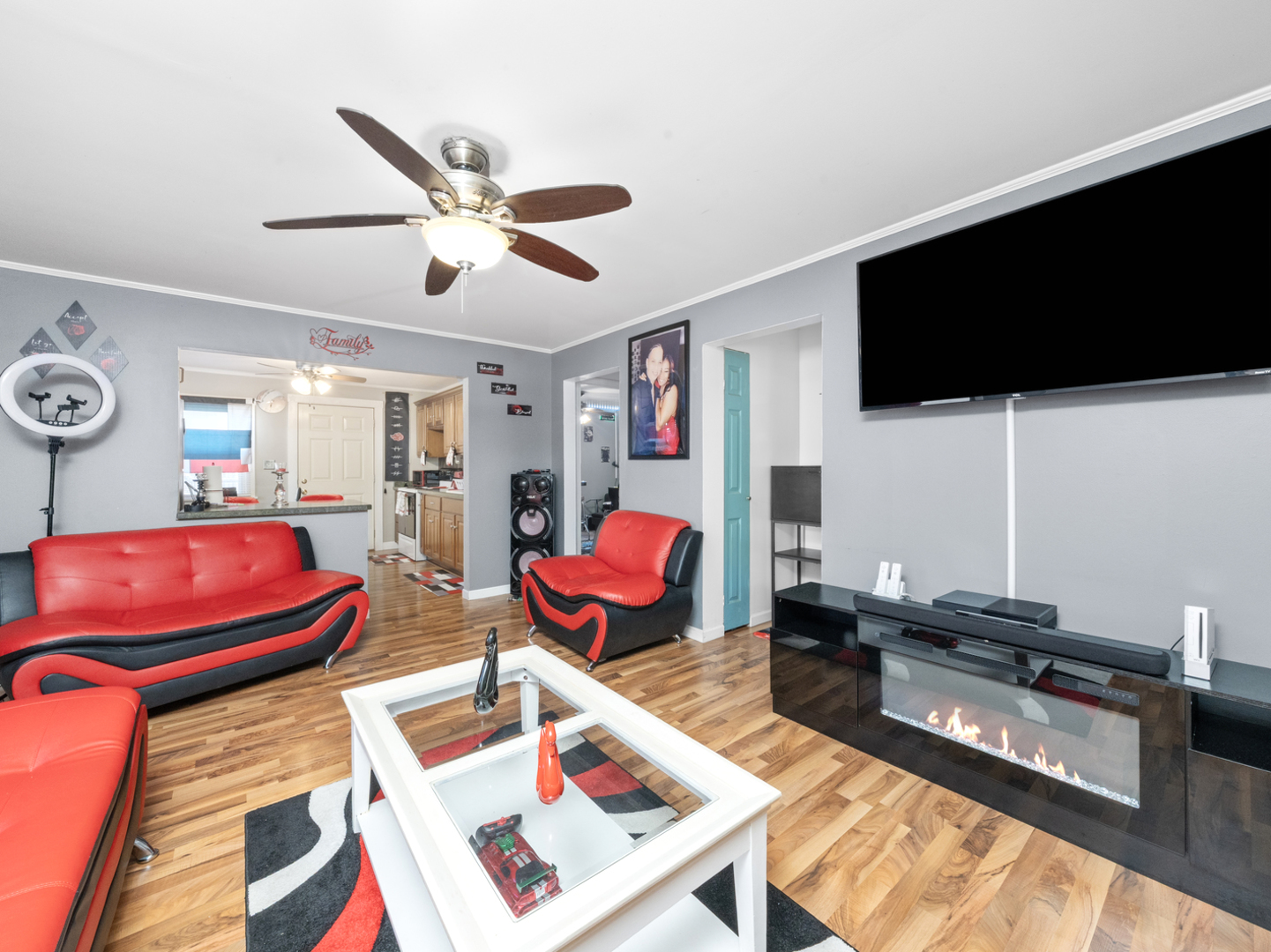 1446 Erie Street Ottawa, IL 61350 - Photo 4 of 41 a living room with furniture and a flat screen tv