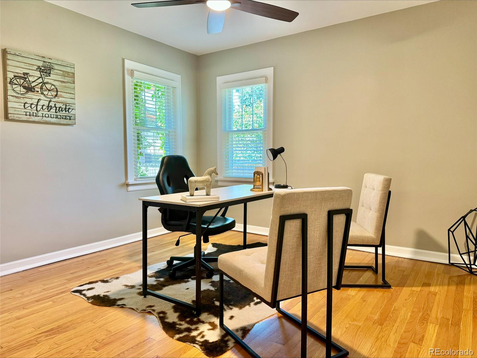 1175 Cook Street Denver, CO 80206 - Photo 17 of 42 a view of a workspace with furniture