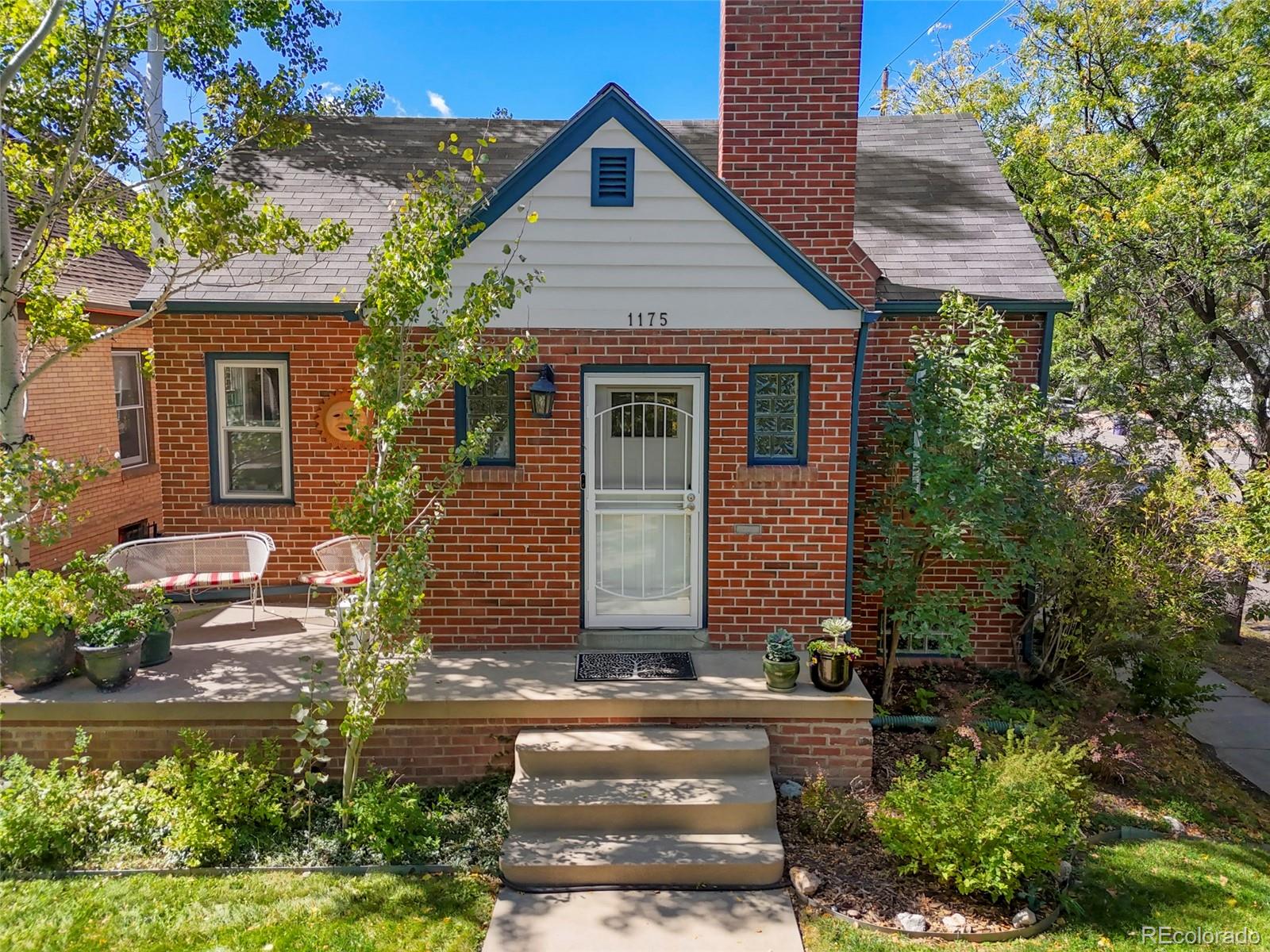 1175 Cook Street Denver, CO 80206 - Photo 2 of 42 front view of a house with a yard