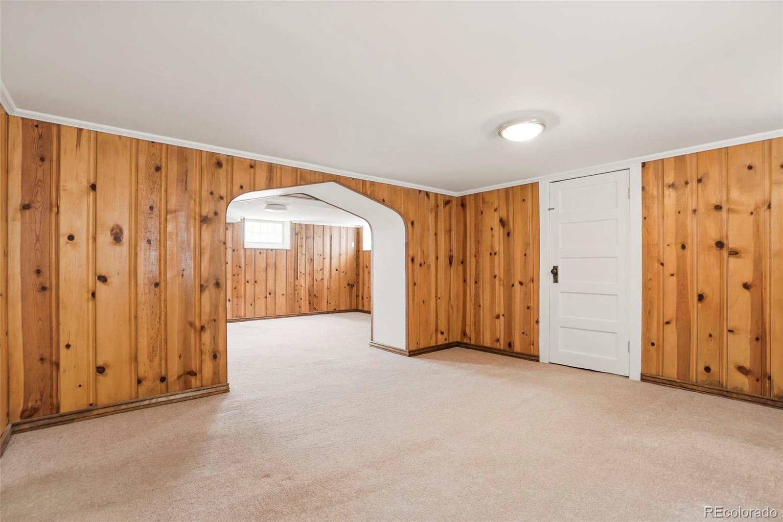 1175 Cook Street Denver, CO 80206 - Photo 26 of 42 an empty room with windows