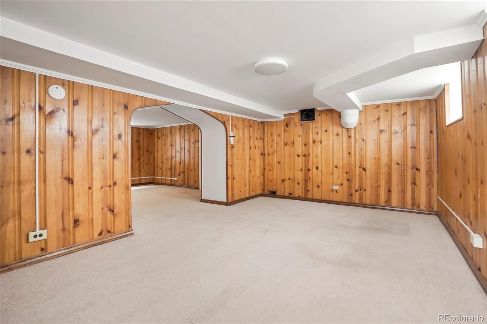 1175 Cook Street Denver, CO 80206 - Photo 29 of 42 an empty room with a natural light