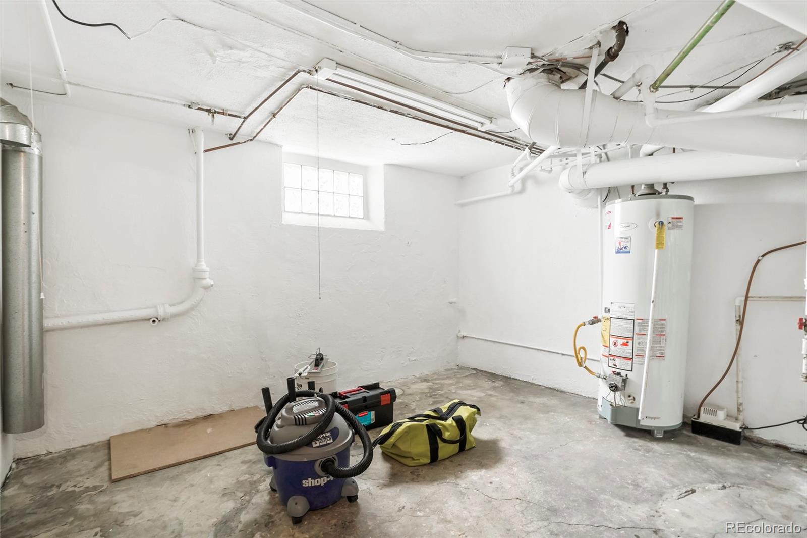 1175 Cook Street Denver, CO 80206 - Photo 33 of 42 a room with gym equipment