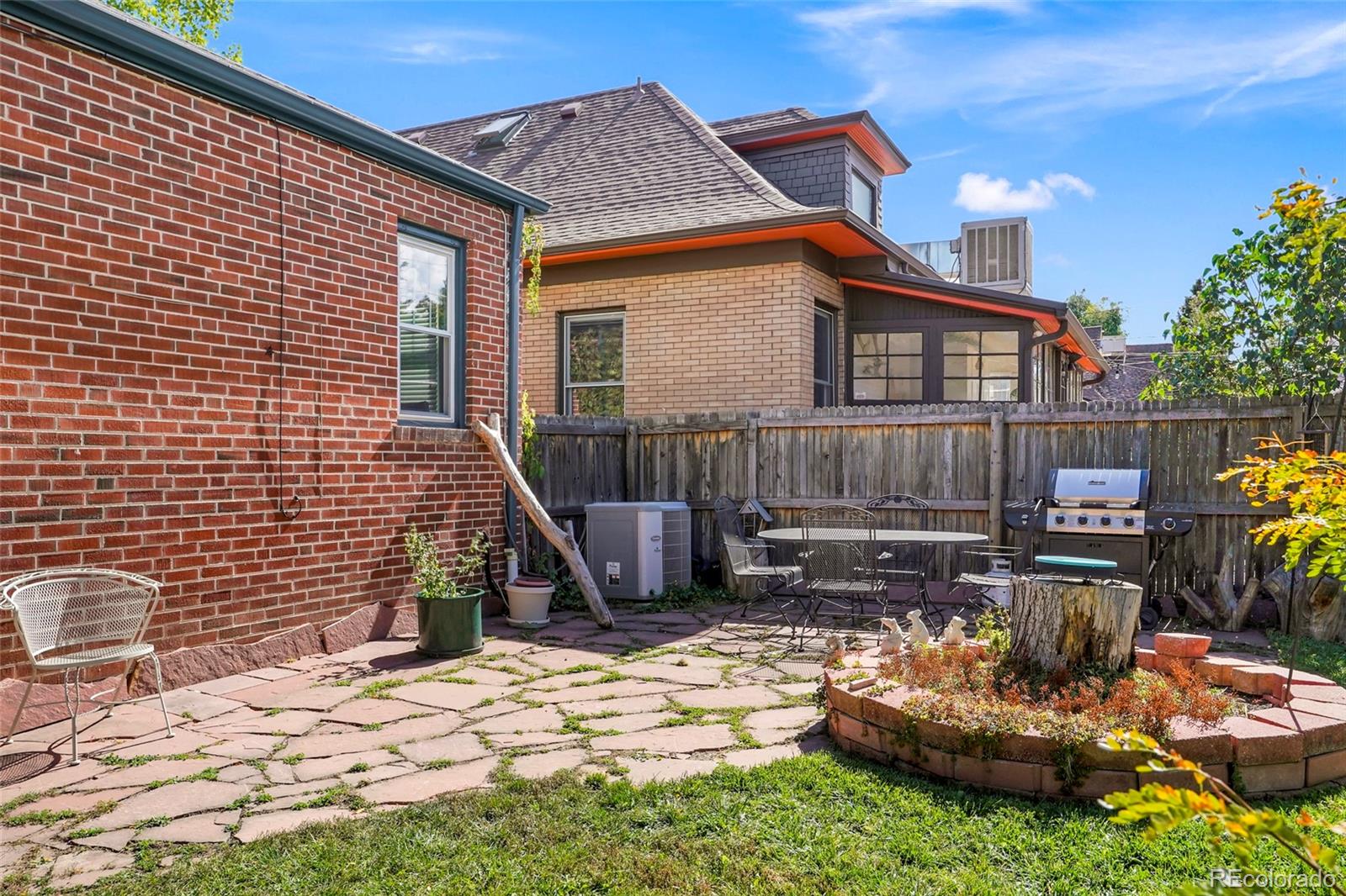1175 Cook Street Denver, CO 80206 - Photo 37 of 42 a view of a house with a patio