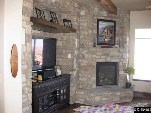 363 Sangre Circle Reno, NV 89511 - Photo 3 of 5 a living room with furniture and a fireplace