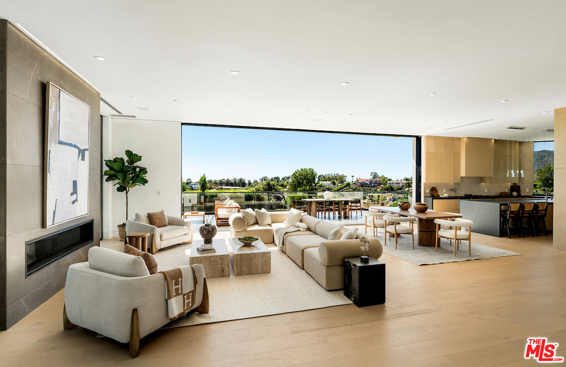 5931 Kanan Dume Road Malibu, CA 90265 - Photo 12 of 50 a living room with furniture and a large window