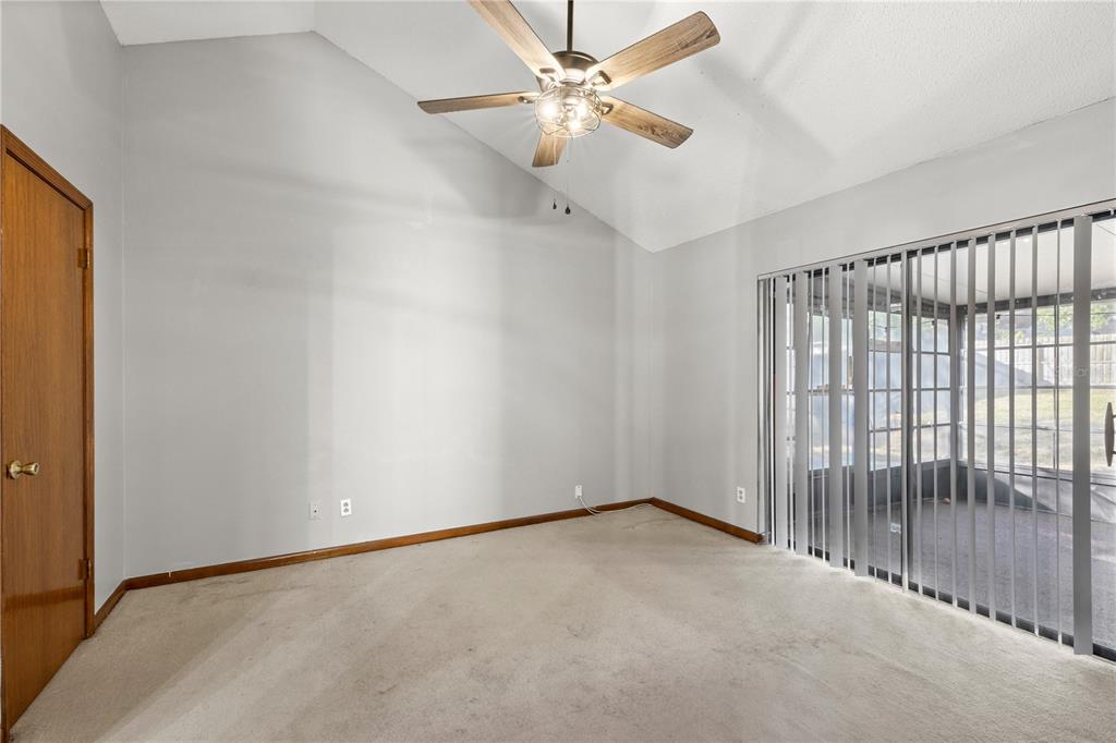 5444 Lighthouse Road Orlando, FL 32808 - Photo 24 of 36 an empty room with fan