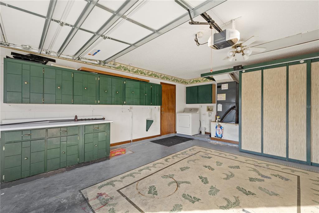 5444 Lighthouse Road Orlando, FL 32808 - Photo 36 of 36 a bathroom with a sink and mirror