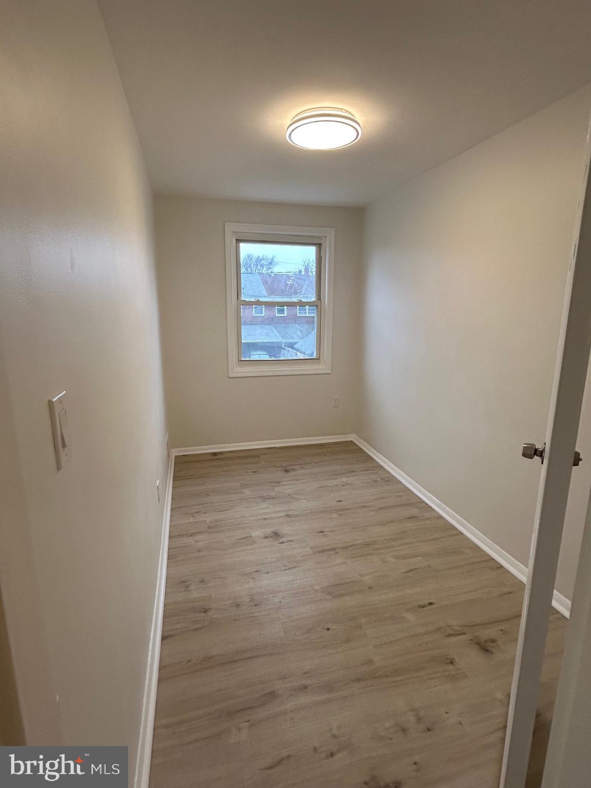 4024 St Augustine Lane Dundalk, MD 21222 - Photo 12 of 17 an empty room with a door