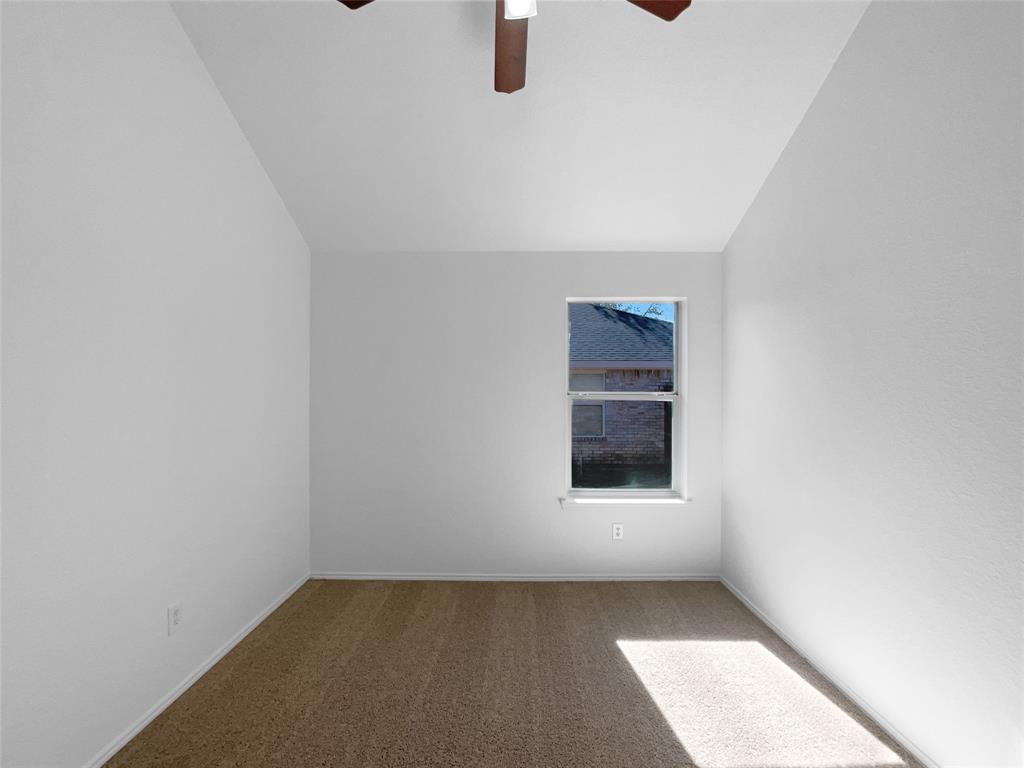 104 Crown Drive Rhome, TX 76078 - Photo 13 of 20 an empty room with windows