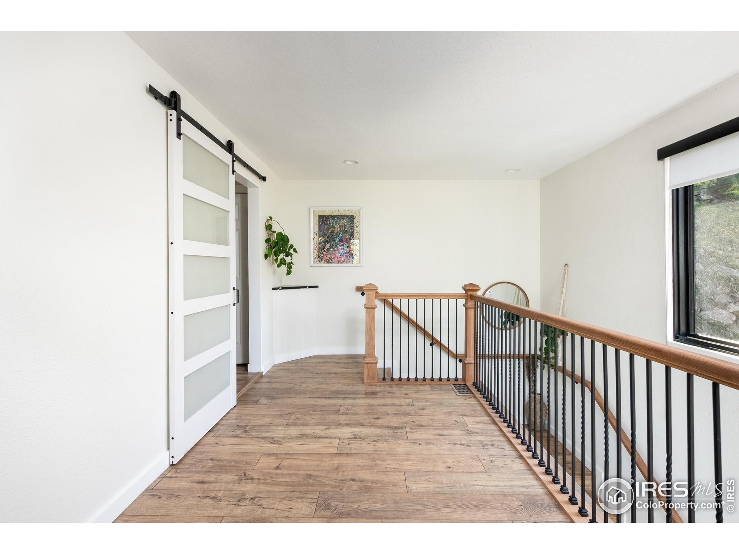 93 Pine Needle Road Boulder, CO 80304 - Photo 20 of 48 a view interior of a house with wooden floor and windows