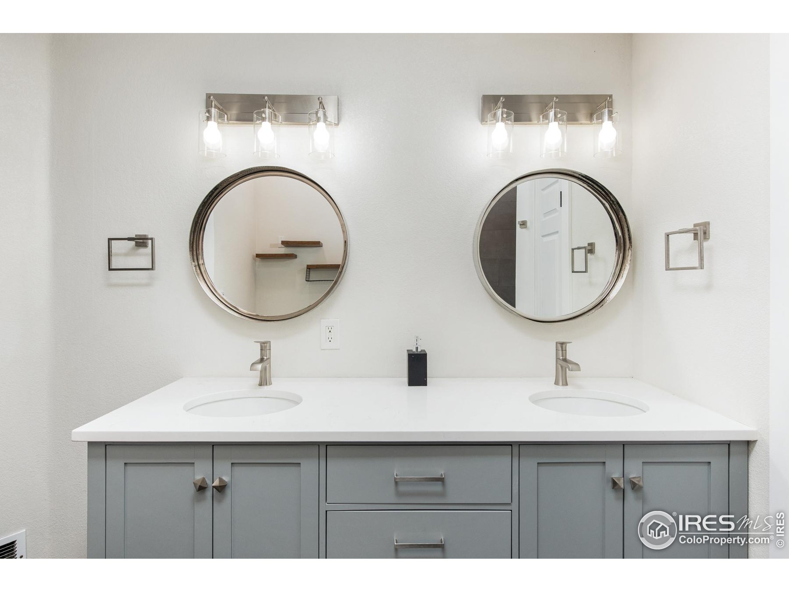 93 Pine Needle Road Boulder, CO 80304 - Photo 43 of 48 a bathroom with a sink and a mirror