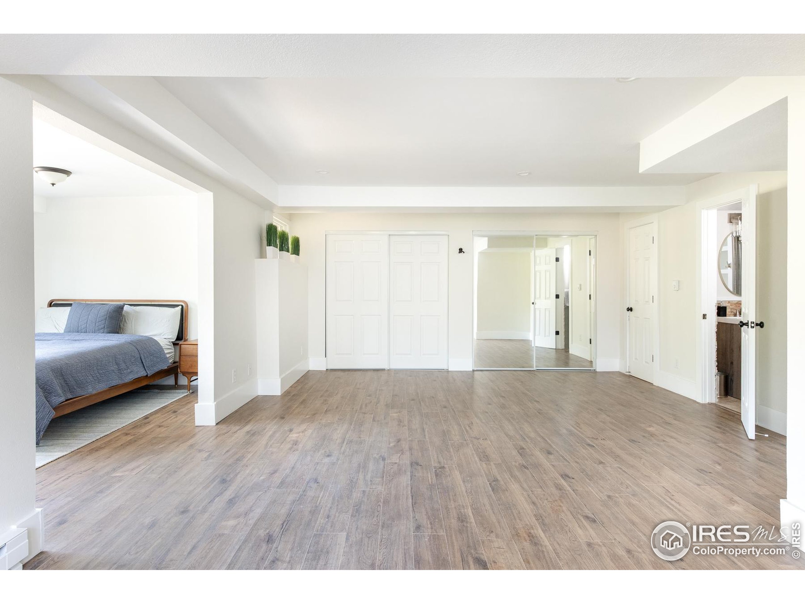 93 Pine Needle Road Boulder, CO 80304 - Photo 9 of 48 a view of livingroom with furniture and wooden floor