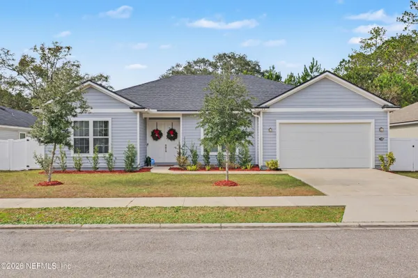 front view of a house with a yard