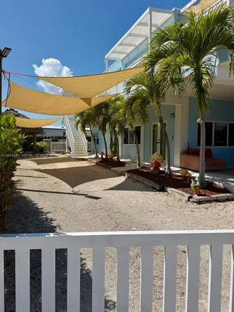 a front view of a house with entertaining space