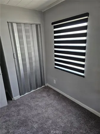 a view of a room that has a window