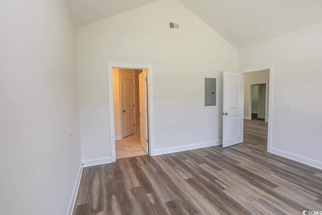 3858 Red Bluff Road Loris, SC 29569 - Photo 16 of 29 Unfurnished bedroom with dark wood-type flooring,