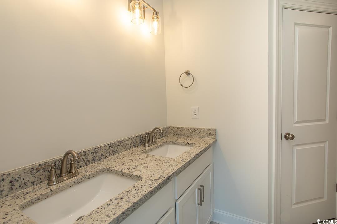 3858 Red Bluff Road Loris, SC 29569 - Photo 17 of 29 Bathroom featuring vanity