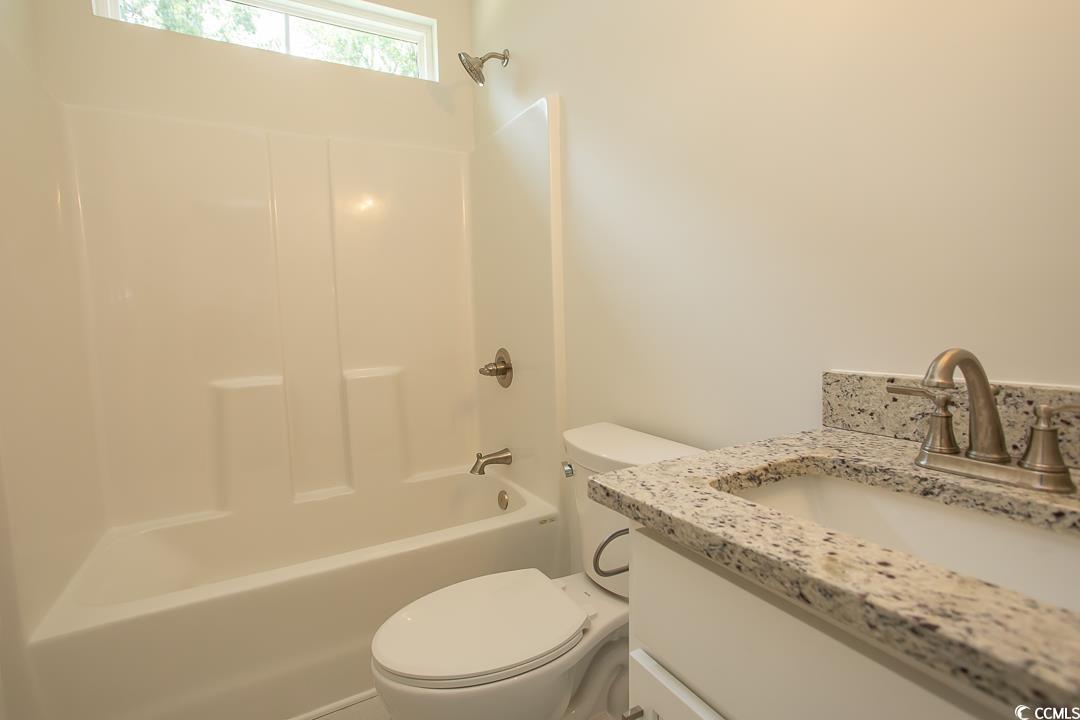 3858 Red Bluff Road Loris, SC 29569 - Photo 25 of 29 Full bathroom featuring washtub / shower combinati