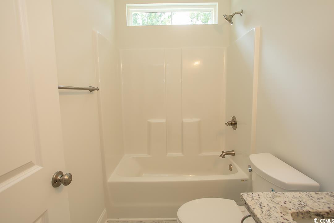 3858 Red Bluff Road Loris, SC 29569 - Photo 26 of 29 Full bathroom with vanity, toilet, and shower com