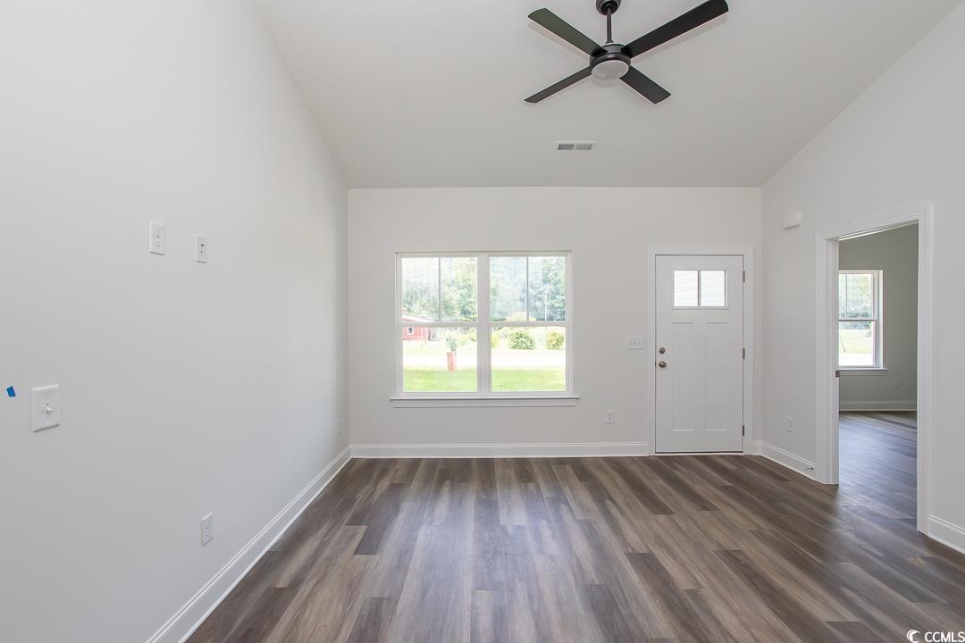3858 Red Bluff Road Loris, SC 29569 - Photo 6 of 29 Entryway featuring dark wood-type flooring, lofted