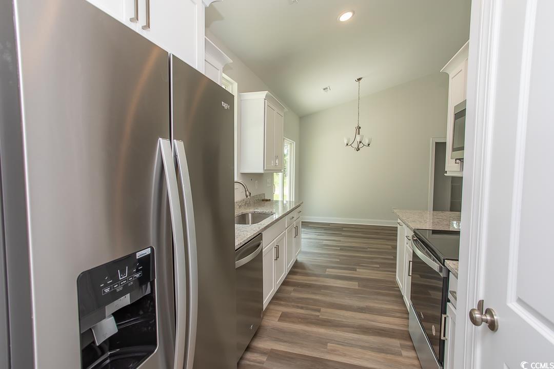 3858 Red Bluff Road Loris, SC 29569 - Photo 10 of 29 Kitchen with stainless steel appliances, white cab