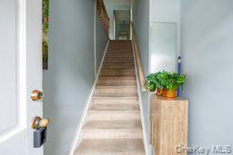 2710 South Road, Unit C8 Poughkeepsie, NY 12601 - Photo 18 of 22 Stairway with carpet