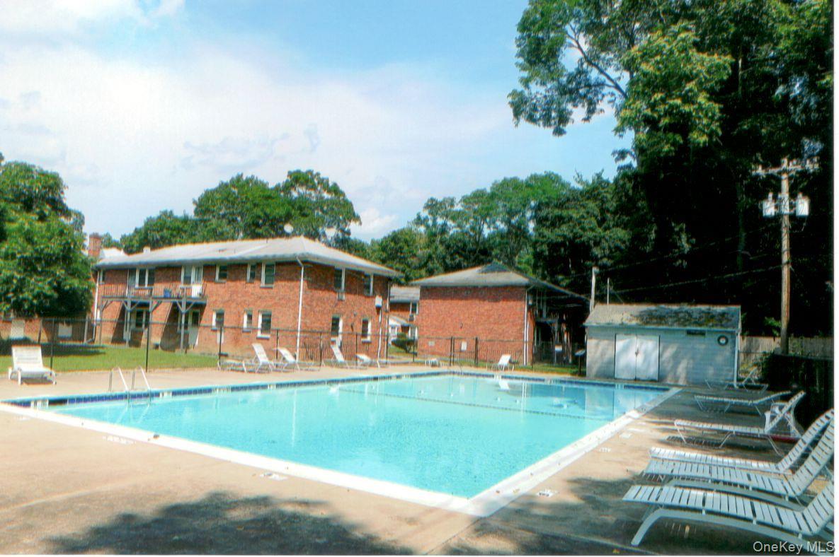 2710 South Road, Unit C8 Poughkeepsie, NY 12601 - Photo 21 of 22 Community pool featuring a patio
