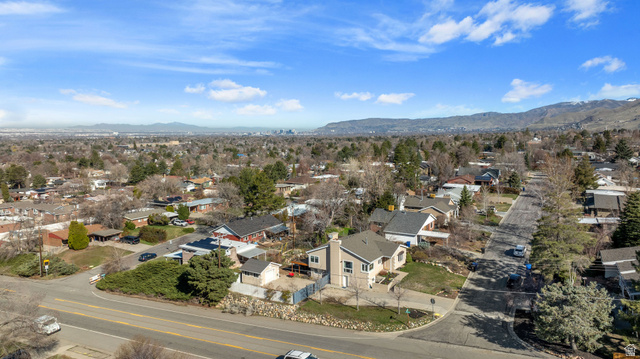 4426 South 3035 East Holladay, UT 84124 - Photo 45 of 49 Aerial view of residential area with mountains