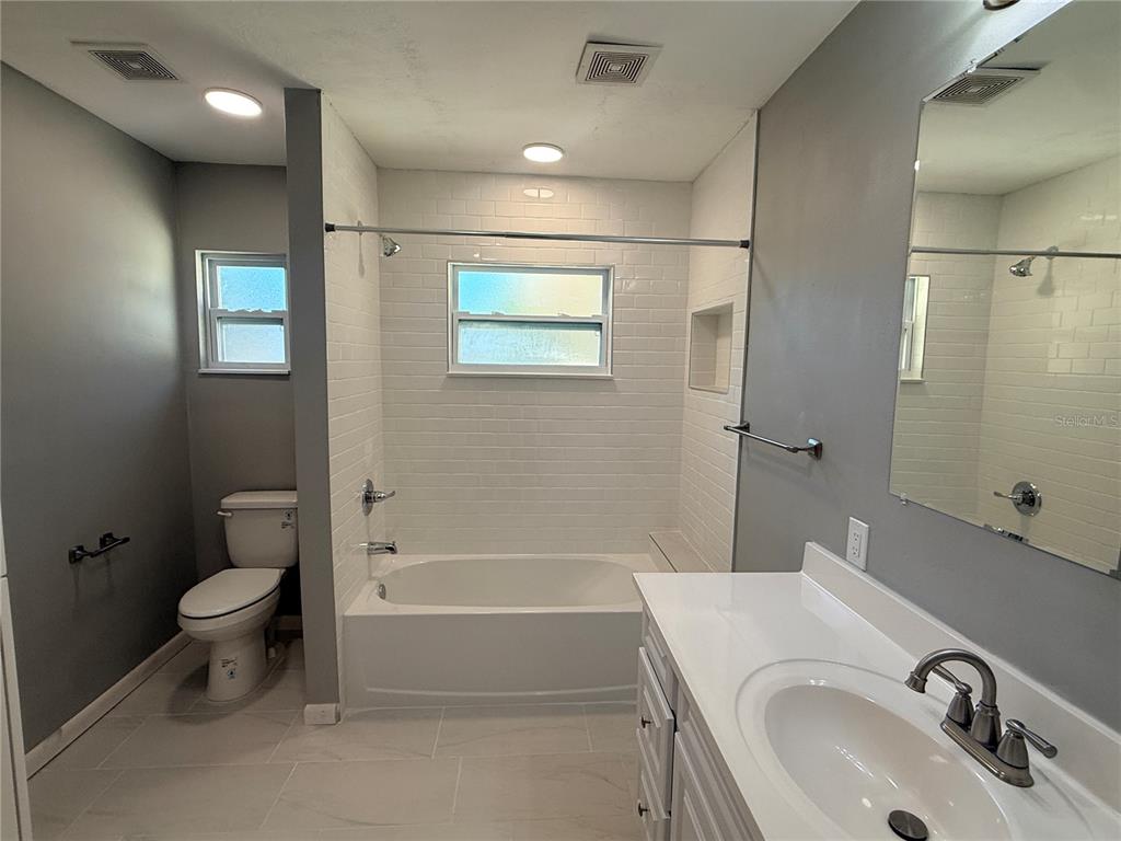 1908 West St Louis Street Tampa, FL 33607 - Photo 6 of 28 a bathroom with a sink toilet and shower