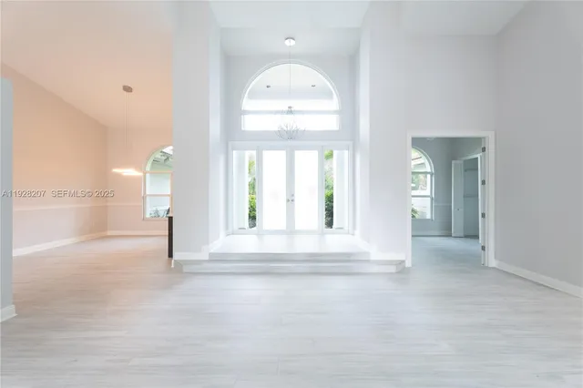 a view of a livingroom with a staircase