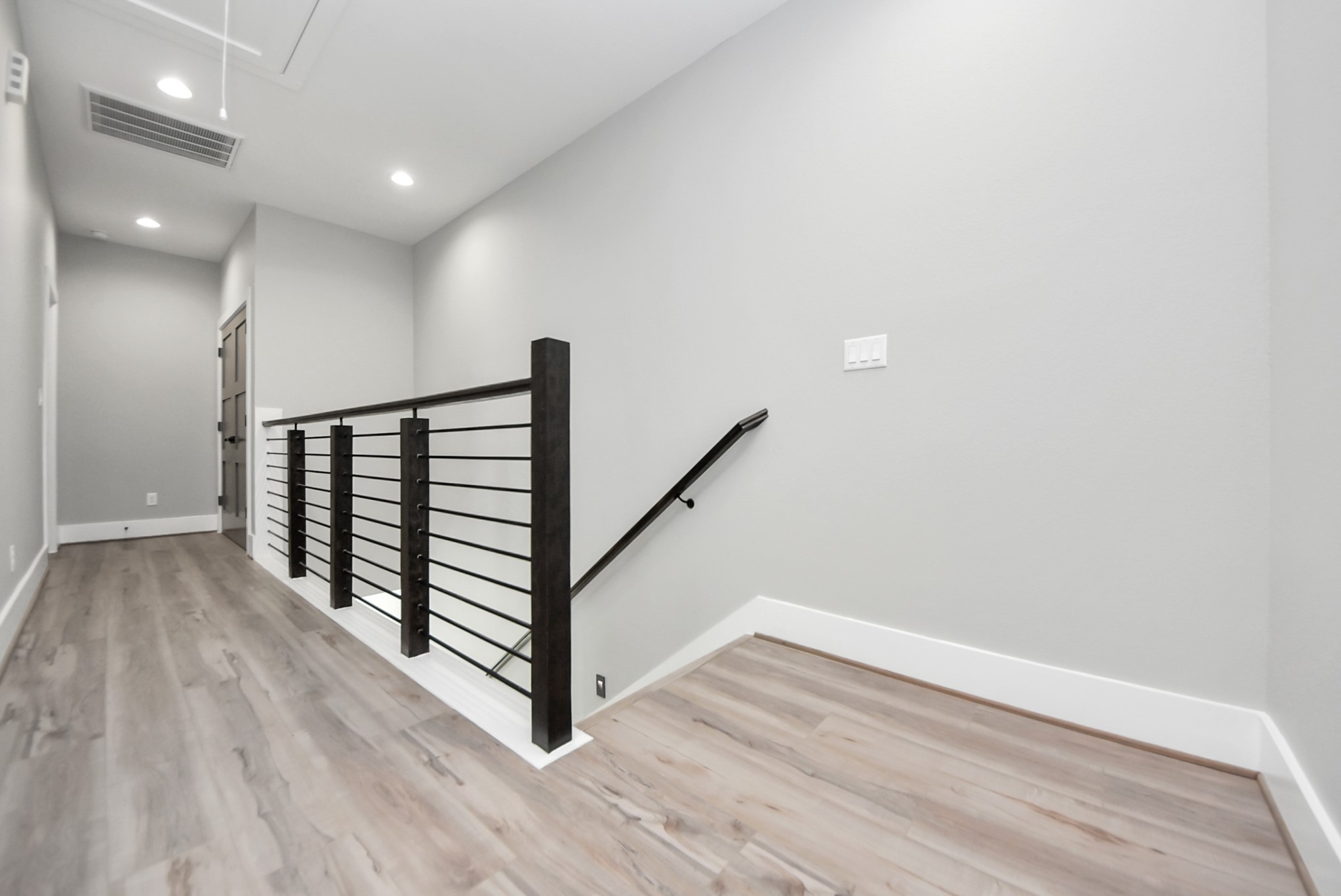 602 West 28th Street, Unit A Houston, TX 77008 - Photo 20 of 41 a view of entryway with wooden floor
