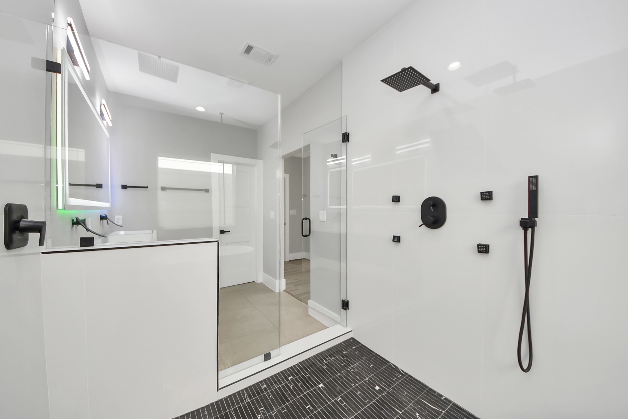 602 West 28th Street, Unit A Houston, TX 77008 - Photo 29 of 41 a bathroom with a shower and a sink