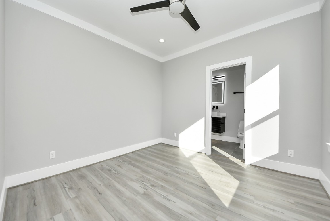 602 West 28th Street, Unit A Houston, TX 77008 - Photo 38 of 41 a view of empty room with wooden floor