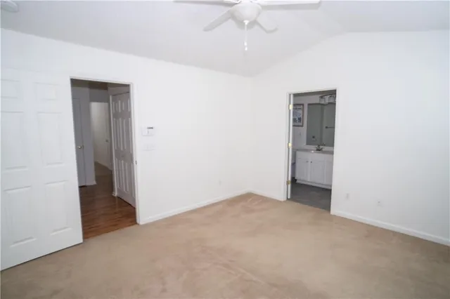 an empty room with a bathroom