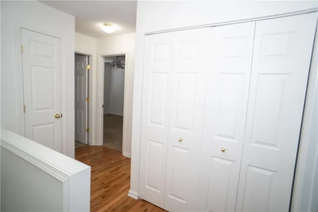 a bathroom with a shower and a sink