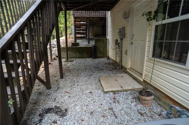a front view of a building with a garden