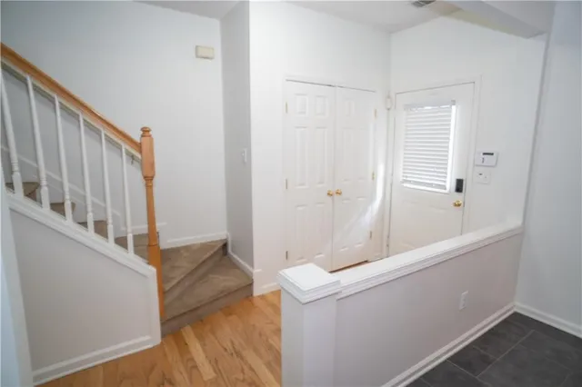 a view of an entryway with staircase