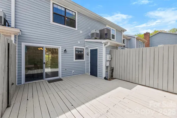 a view of a house with a roof deck