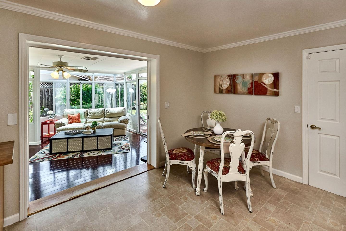2330 Maximilian Drive Campbell, CA 95008 - Photo 15 of 33 a dining room with furniture and a floor to ceiling window