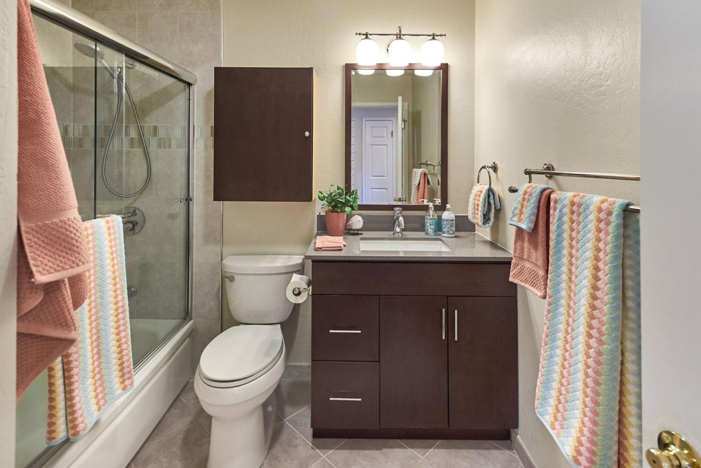 2330 Maximilian Drive Campbell, CA 95008 - Photo 23 of 33 a bathroom with a sink vanity mirror and toilet