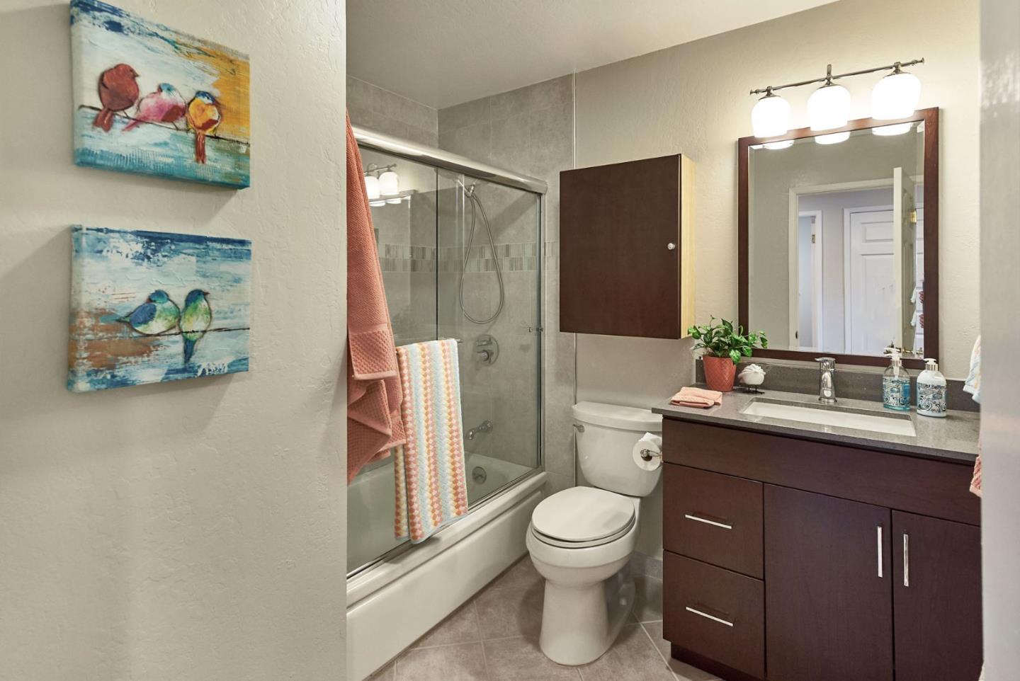 2330 Maximilian Drive Campbell, CA 95008 - Photo 24 of 33 a bathroom with a toilet a sink and glass door