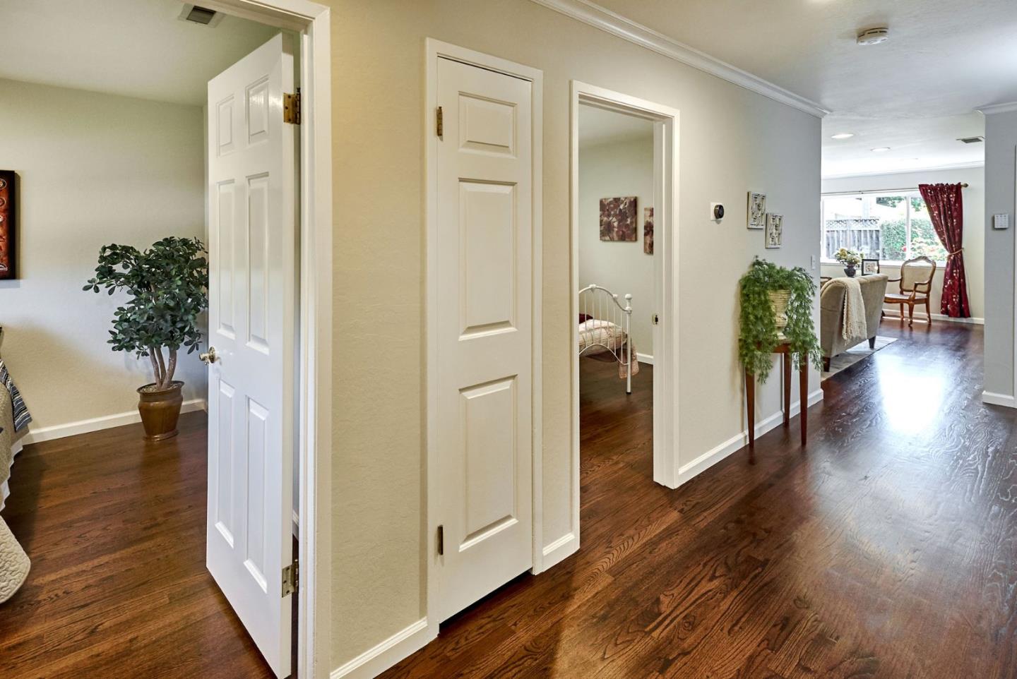 2330 Maximilian Drive Campbell, CA 95008 - Photo 28 of 33 a view of a hallway and interior of livingroom with wooden floor