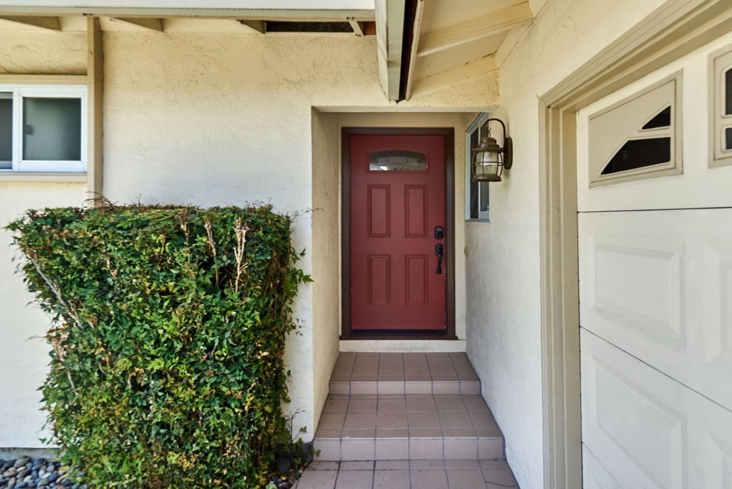 2330 Maximilian Drive Campbell, CA 95008 - Photo 3 of 33 a front view of a house with a yard