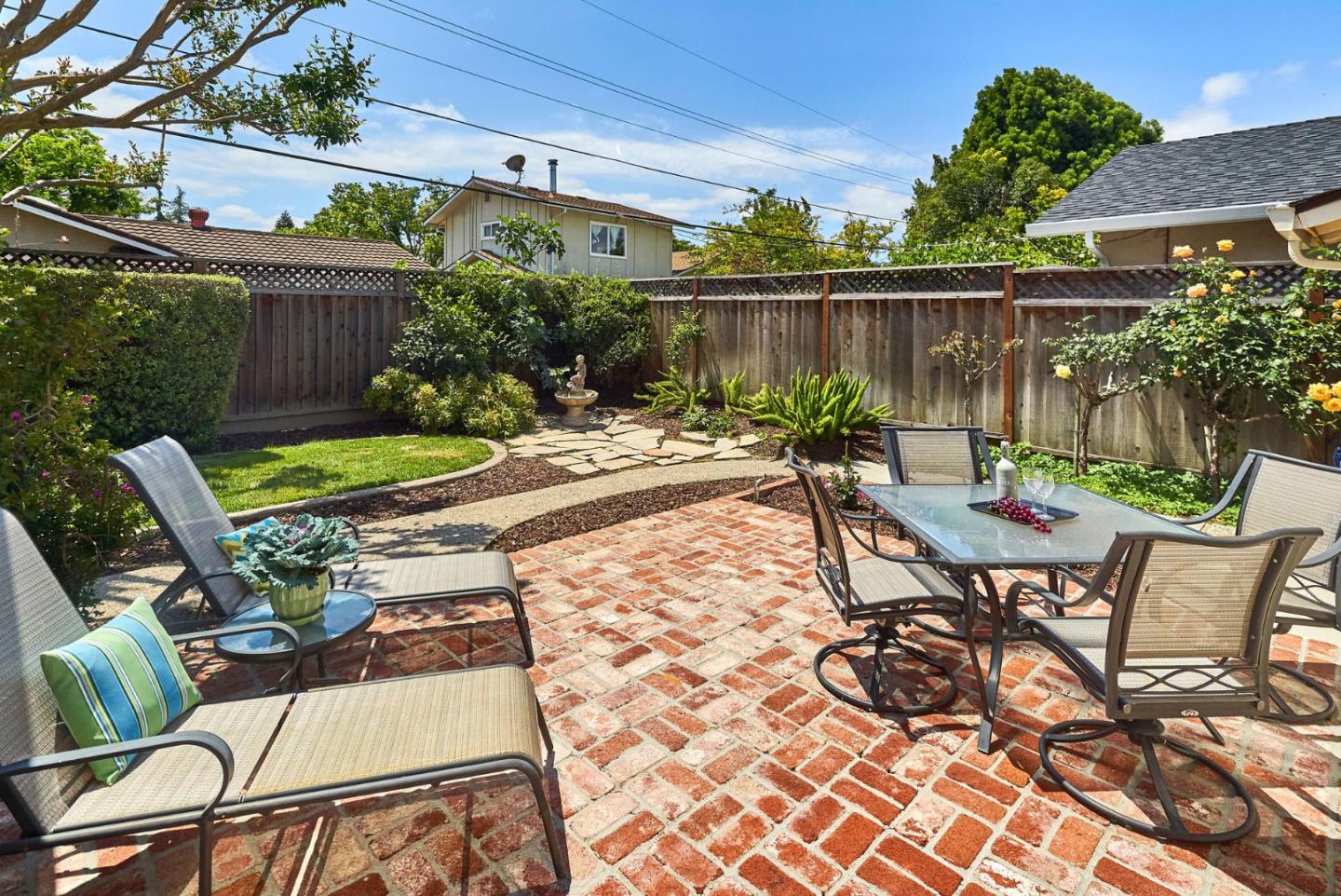 2330 Maximilian Drive Campbell, CA 95008 - Photo 33 of 33 a view of a chair and table in backyard of the house