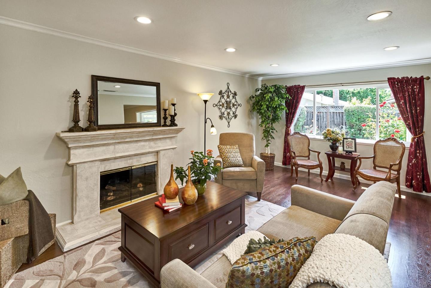 2330 Maximilian Drive Campbell, CA 95008 - Photo 9 of 33 a living room with furniture and a fireplace