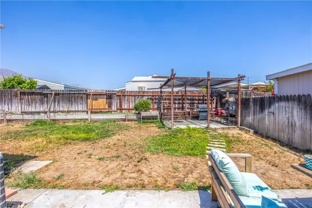 a view of a backyard with a patio