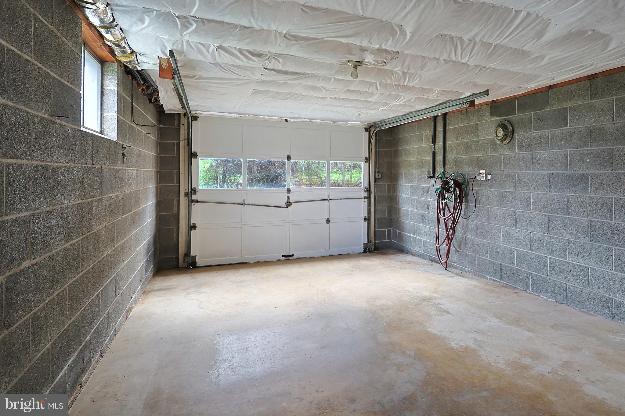 159 Rocket Center Road Keyser, WV 26726 - Photo 49 of 64 a view of a big room with windows