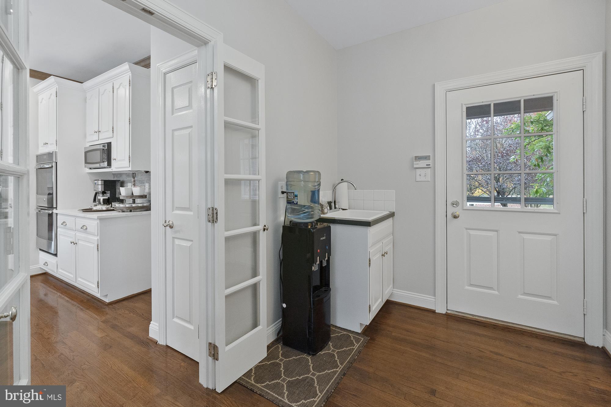 12649 High Meadow Road North Potomac, MD 20878 - Photo 44 of 79 Easy access from kitchen to 3-car garage.